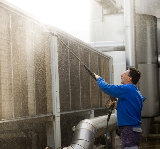 a man standing in front of a building